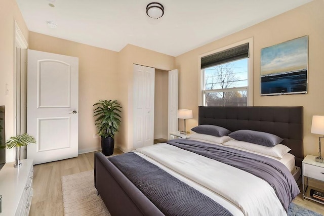 bedroom with light hardwood / wood-style floors