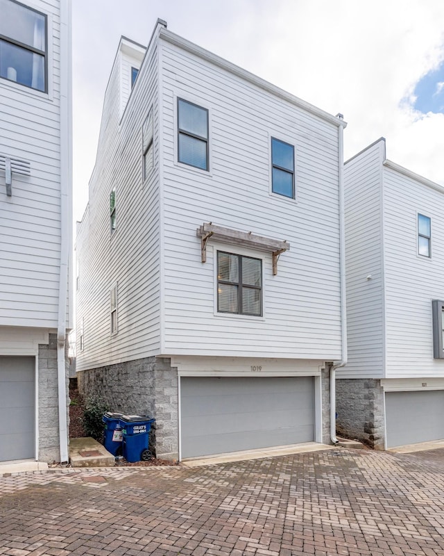 view of home's exterior with a garage