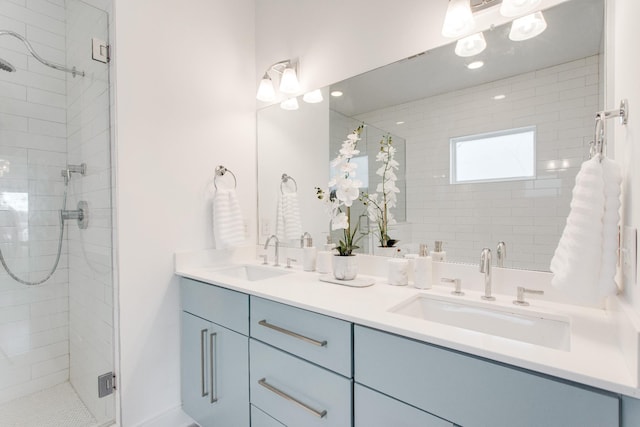 bathroom with vanity and an enclosed shower