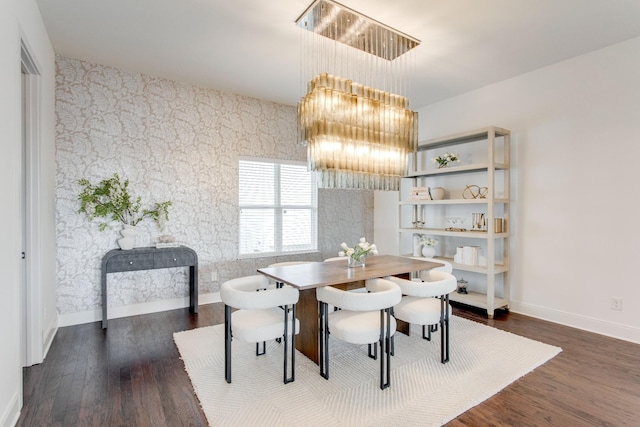 dining room featuring a chandelier and dark hardwood / wood-style flooring