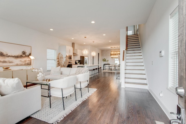 living room with dark hardwood / wood-style floors