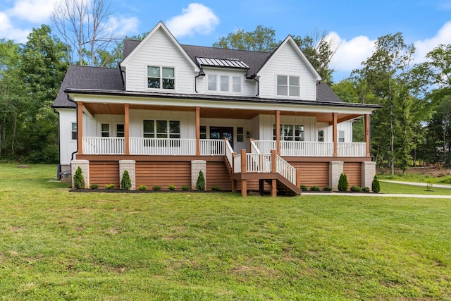 view of front of property featuring a porch and a front lawn