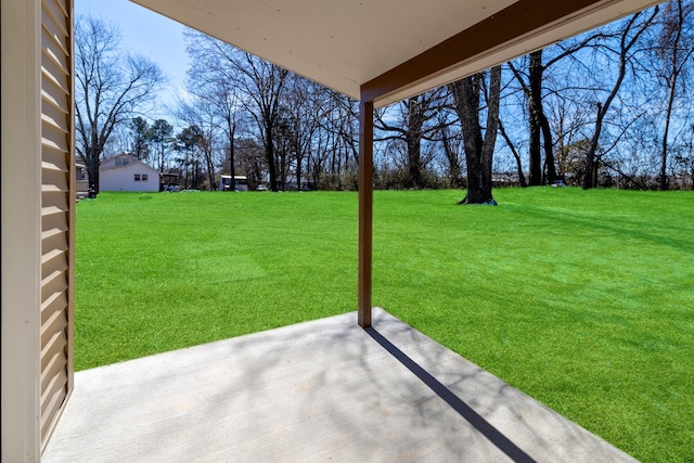 view of yard with a patio area