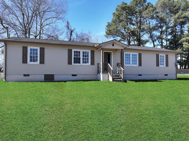 view of front facade featuring a front yard and crawl space