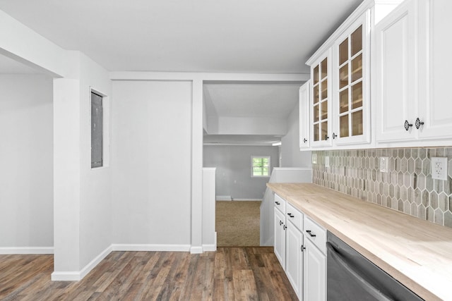 bar with dark hardwood / wood-style flooring, backsplash, dishwasher, white cabinets, and butcher block counters