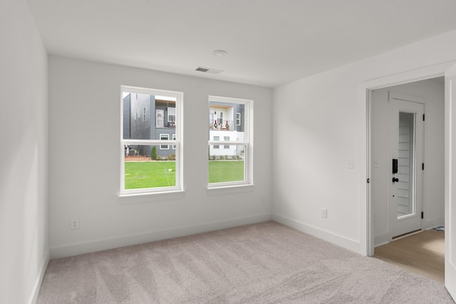 view of carpeted spare room