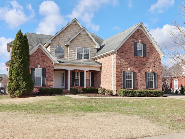 view of front of house featuring a front lawn