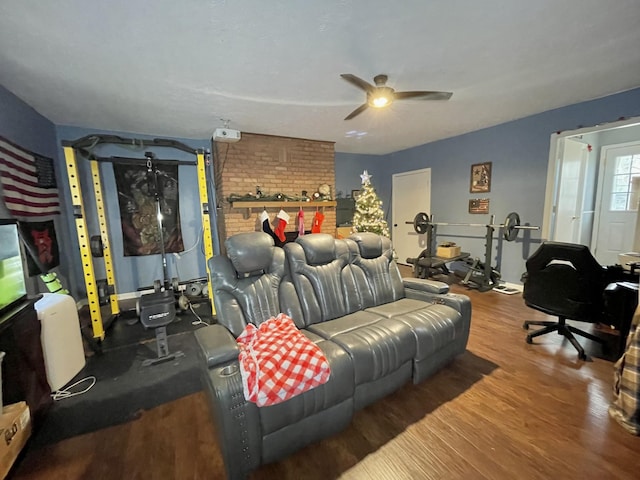 living room featuring wood-type flooring and ceiling fan