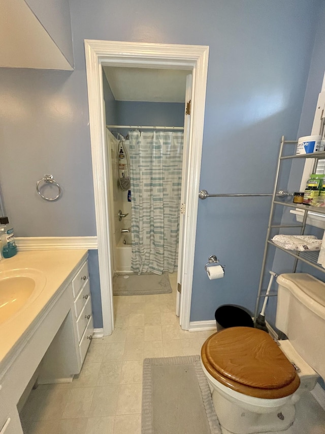 bathroom featuring tile patterned floors, shower / bathtub combination with curtain, and toilet