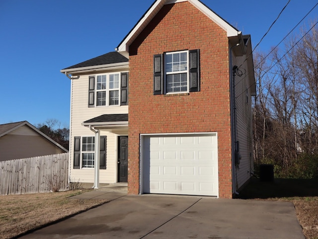 view of property with a garage