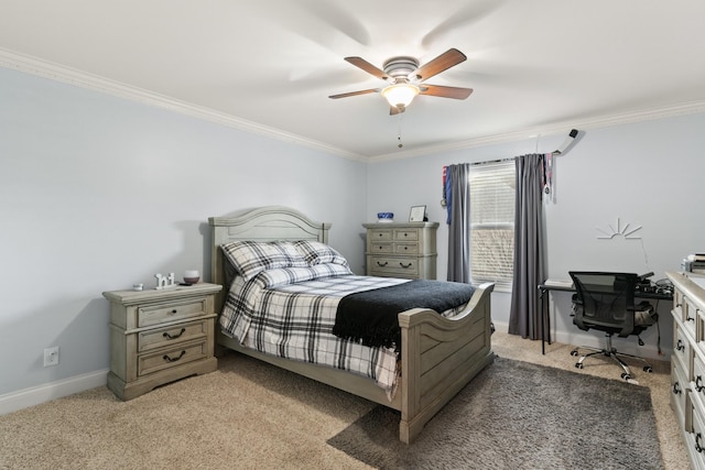 carpeted bedroom featuring ceiling fan and ornamental molding