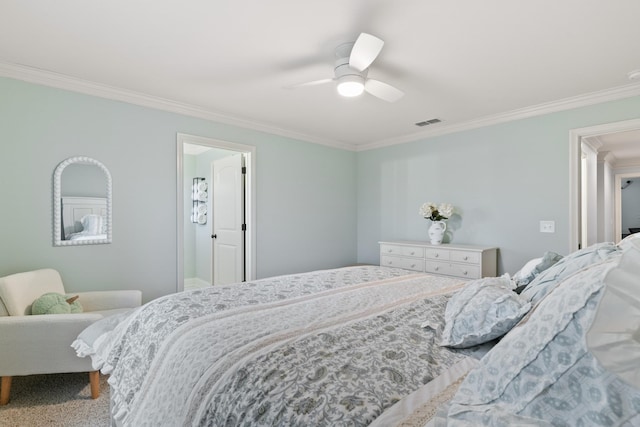 bedroom with ceiling fan, crown molding, and carpet flooring