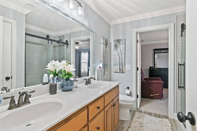 bathroom featuring toilet, hardwood / wood-style flooring, ceiling fan, walk in shower, and vanity