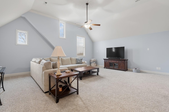 carpeted living room featuring ceiling fan, vaulted ceiling, and a healthy amount of sunlight