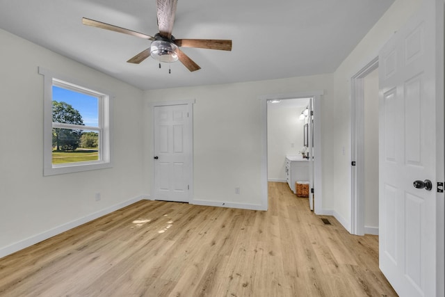 unfurnished bedroom featuring light hardwood / wood-style floors and ceiling fan