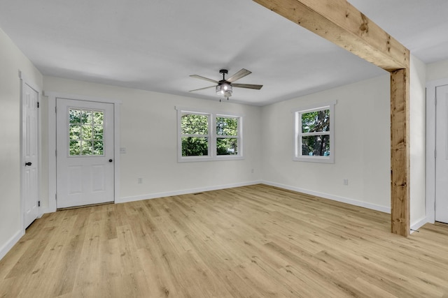 foyer entrance featuring ceiling fan, beam ceiling, and light hardwood / wood-style flooring