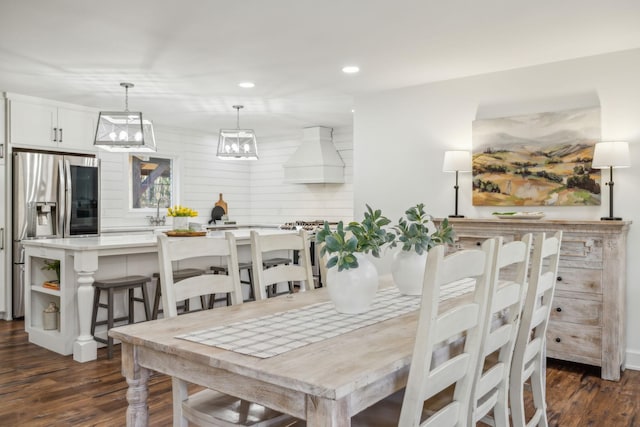 dining area featuring dark hardwood / wood-style flooring