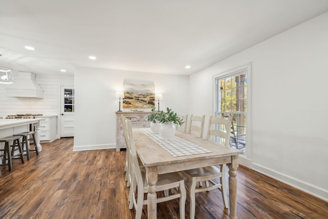 dining area featuring dark hardwood / wood-style flooring