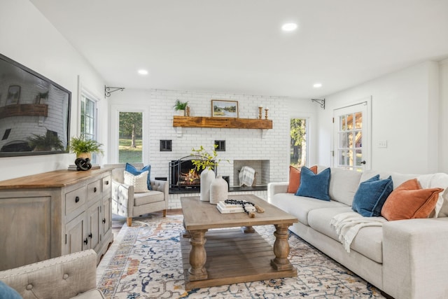 living room featuring a fireplace