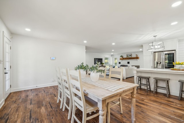 dining room featuring dark wood-type flooring