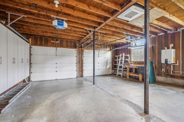 garage featuring tankless water heater and a garage door opener