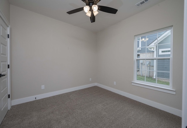 carpeted empty room with ceiling fan