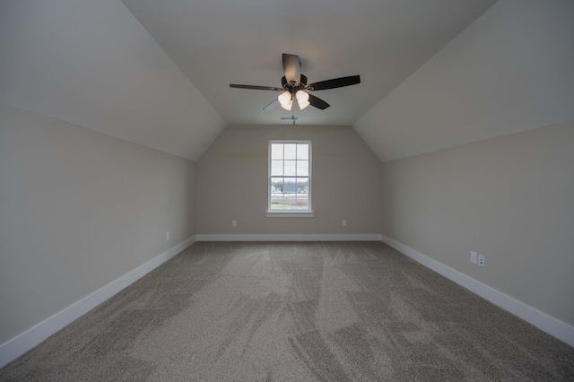 bonus room with ceiling fan, carpet, and vaulted ceiling