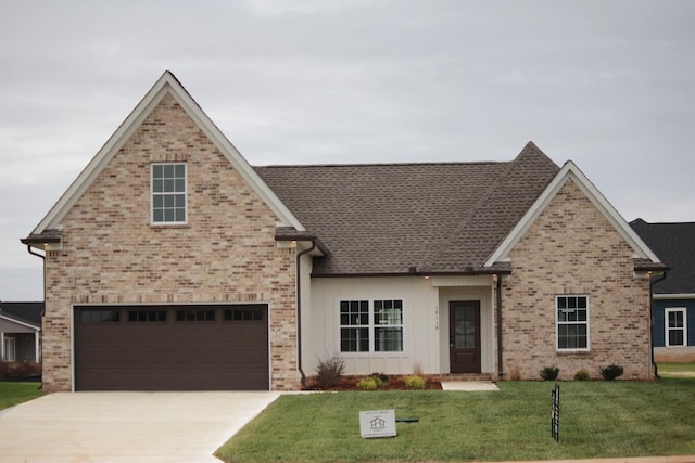 10118 Bighorn Ln, Bell Buckle, TN 37020 - view of front of property with concrete driveway, a front lawn, brick siding, and roof with shingles