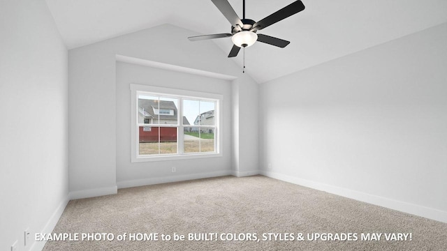 spare room with ceiling fan, carpet flooring, and vaulted ceiling