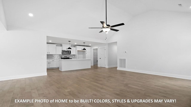 unfurnished living room featuring high vaulted ceiling, ceiling fan, and light wood-type flooring