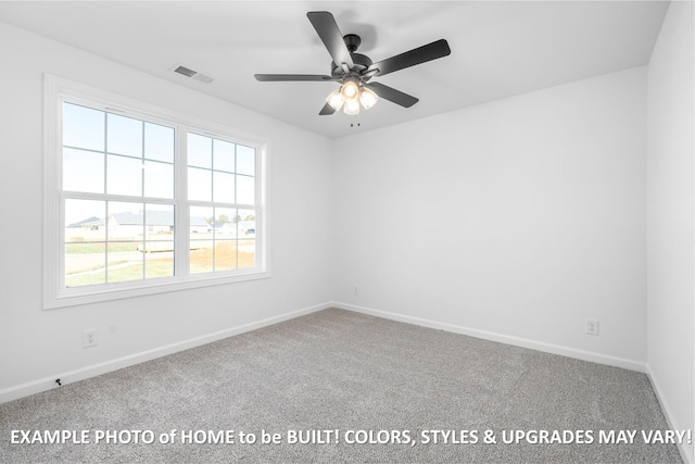 spare room featuring carpet, visible vents, ceiling fan, and baseboards