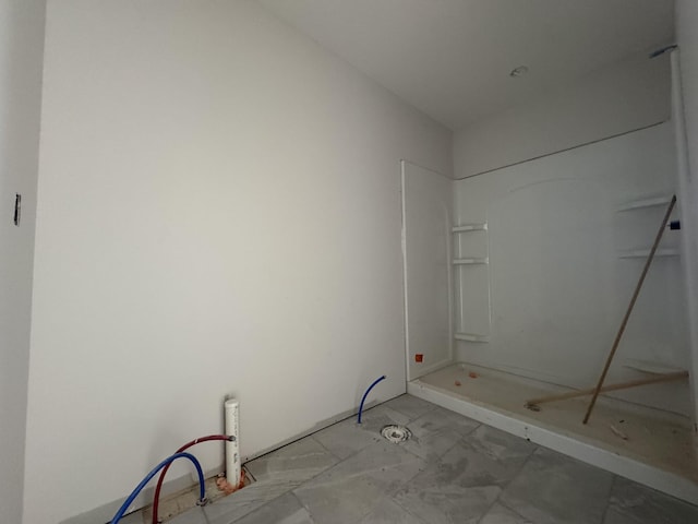 bathroom featuring walk in shower