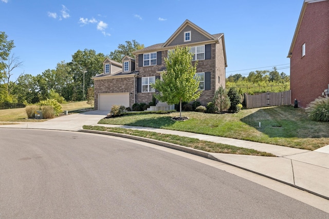 view of front facade featuring a garage and a front yard