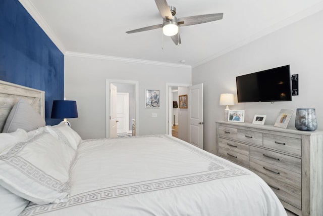 bedroom with ceiling fan and ornamental molding