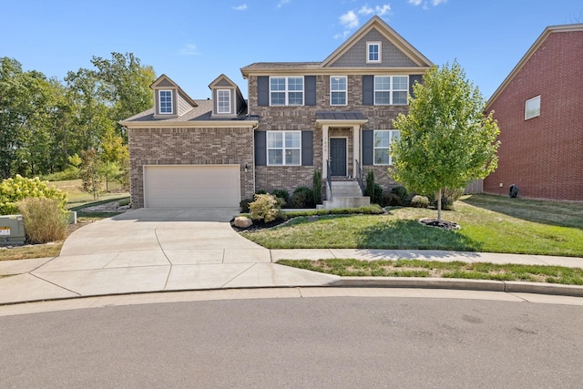 view of front of house featuring a front lawn and a garage