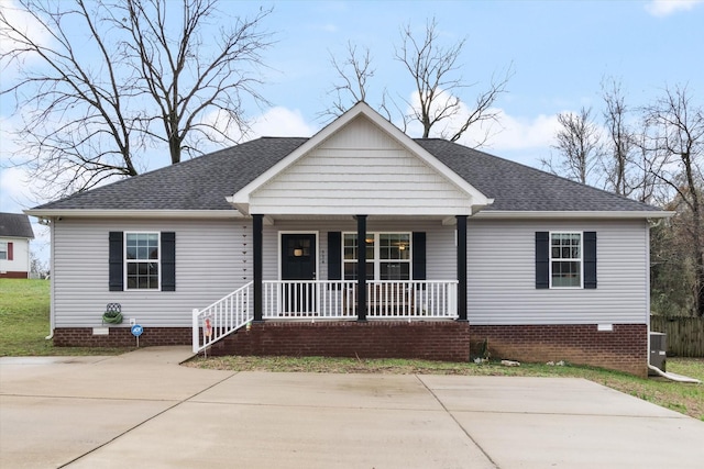 view of front of house with cooling unit and covered porch