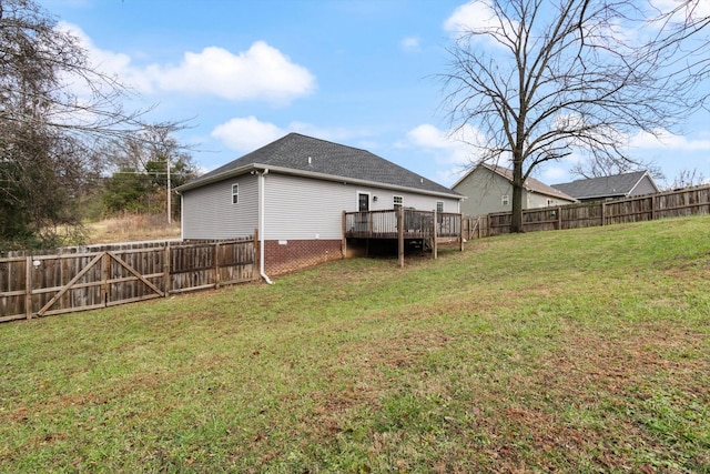 view of yard with a wooden deck