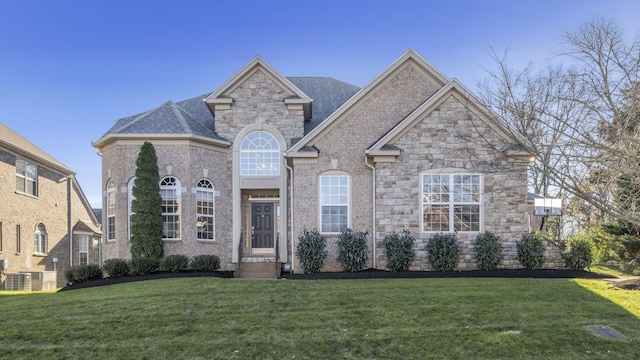 view of front of property with a front lawn