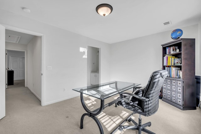 home office with light colored carpet