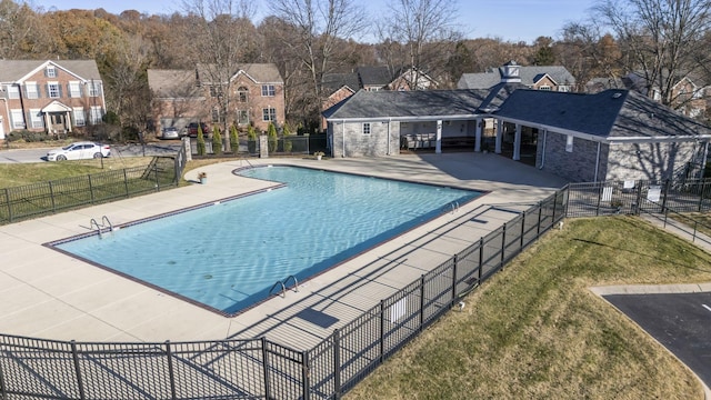 view of swimming pool featuring a patio area