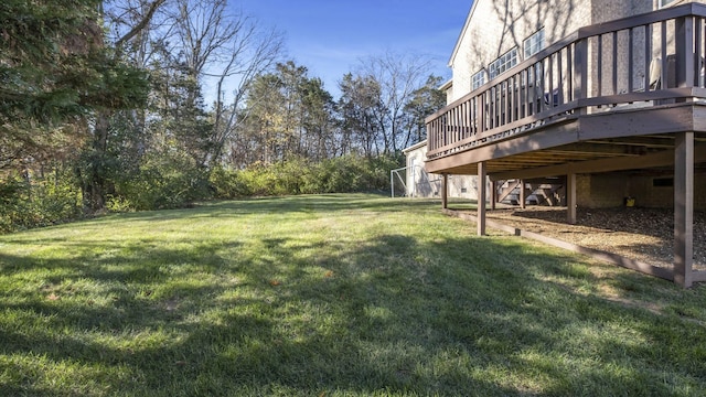 view of yard with a deck