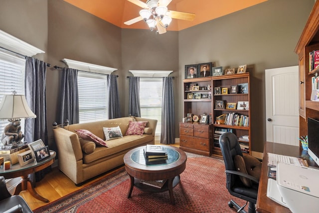 office space featuring ceiling fan and hardwood / wood-style flooring