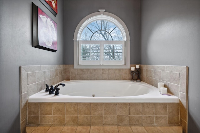 bathroom with tiled bath