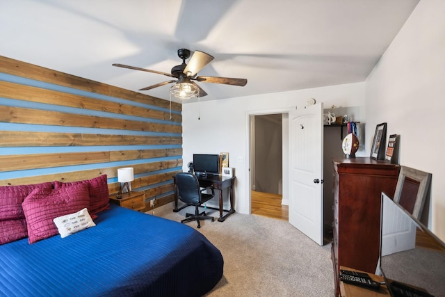 bedroom featuring ceiling fan and light colored carpet