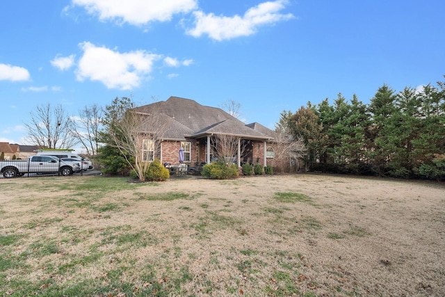 view of front of property with a front lawn