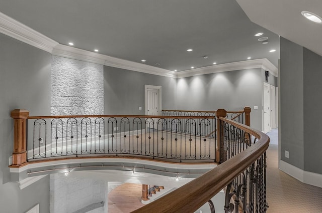 hall featuring crown molding and carpet floors