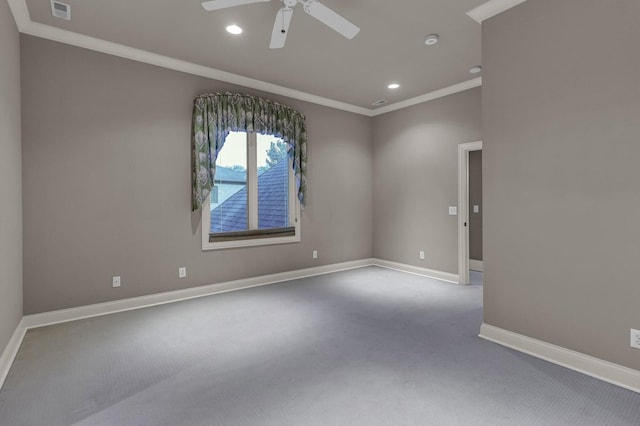 unfurnished room featuring ceiling fan, crown molding, and light carpet