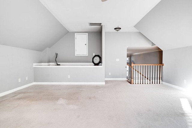 bonus room with carpet and lofted ceiling