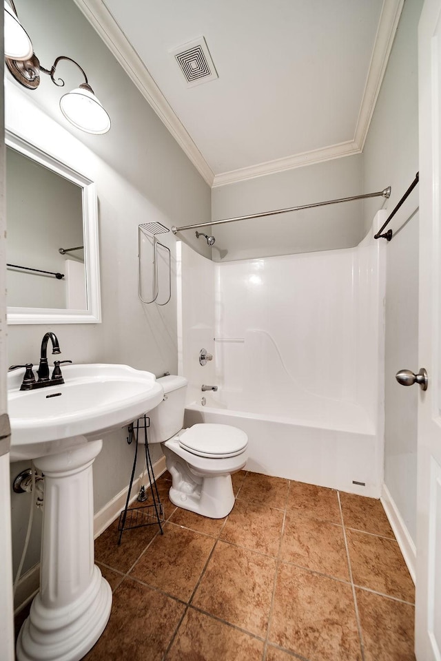 bathroom with toilet, shower / tub combination, and crown molding