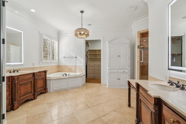 bathroom featuring vanity, tile patterned floors, a chandelier, and crown molding